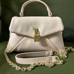 Elegant Cream Handbag with Gold Accents